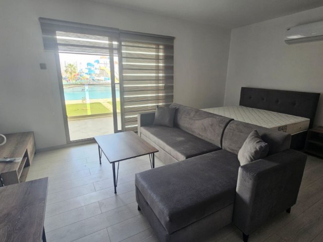 İSKELE LONG BEACH EDELWİSE SİTESİNDE EŞYALI SATILIK STUDIO 100.000 POUND ESYALI OLARAK SATISA SUNULMUSTUR.SIFIR DAİRE 1.KATTA