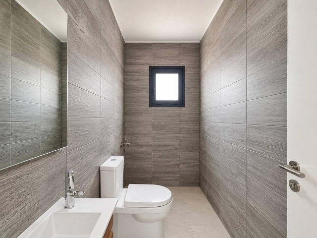 ESENTEPE  SUNSET BAY  1+1  YENİ DAİRE SATILIK BAHÇELİ DENİZE SIFIR (MASRAFLAR FİYATA DAHİL)