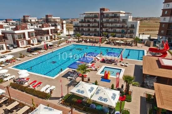 E2   -  Acil satılık  Royal Sun Elit   1+1 İskele Long Beach    /Срочно продается квартира Royal Sun Elite 1+1, Искеле, Лонг-Бич.