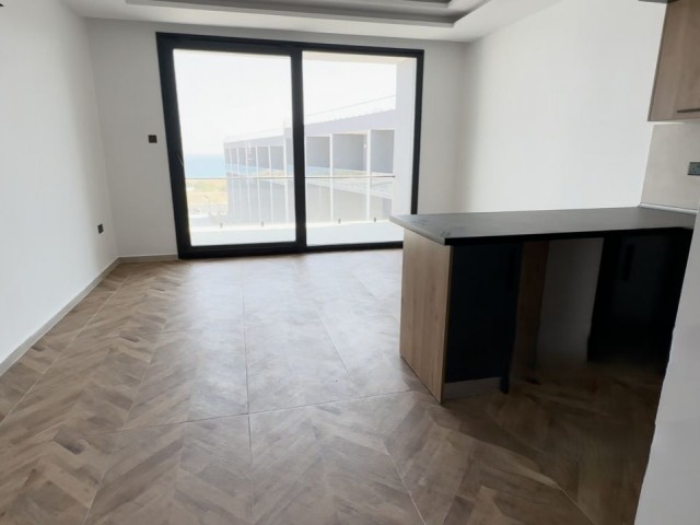 GİRNE-LAPTA'DA TAŞINMAYA HAZIR SATILIK 1+1 DAİRE