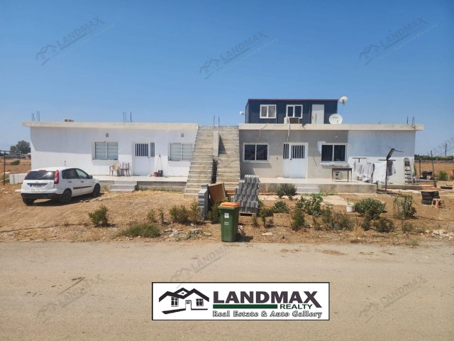 KUZEY KIBRIS GÜZELYURT YUKARI BOSTANCI BÖLGESİNDE SATILIK İÇERİSİNDE 2 ADET 2+1 EV BULUNAN 7633m2 ARAZİ !