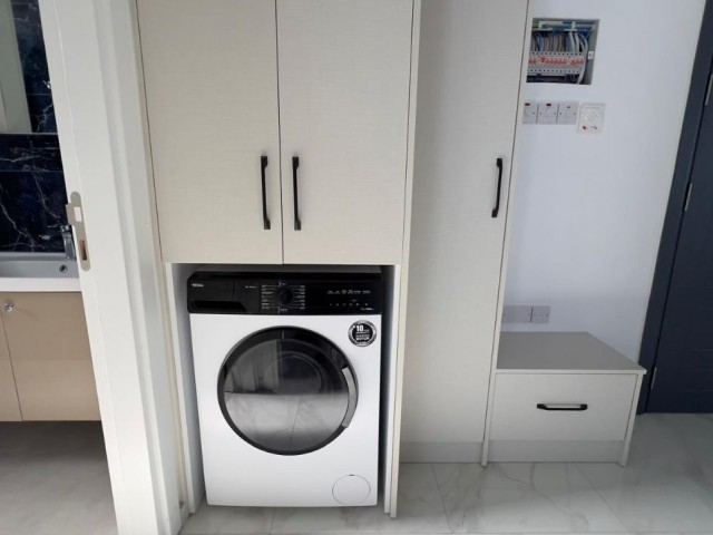 Girne, Lapta'da  havuzlu site içerisinde yeni bitmiş 2+1 daire. 05338403555