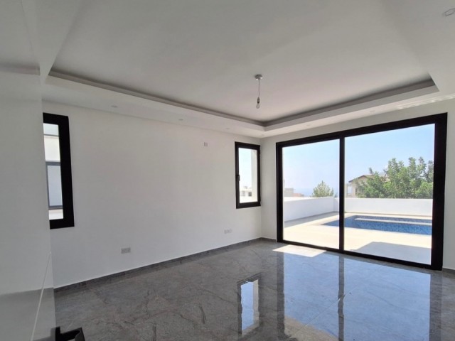 Çatalköy bölgesinde satılık 3 yatak odalı yeni hemen teslim villa