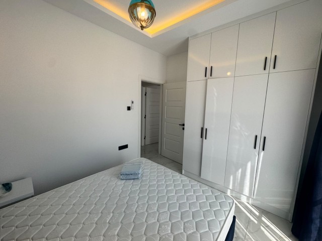 Girne Alsancakta Kapalı Otopark ve Havuzlu Site İçerisinde Sıfır Binada Eşyalı Satılık 2+1 Daire