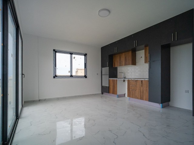 Girne Merkez Satılık 2+1 Daire | Yeni Apartmanda Merkezi Lokasyon - Fotoğraf 1