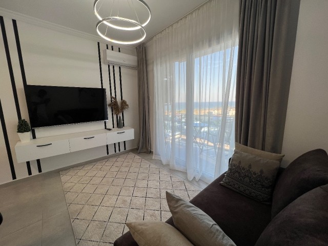 SOK FIYAT SAHIBINDEN! Iskele LONG BEACH deniz manzaralı 1+1 ful eşyalı daire - Fotoğraf 1