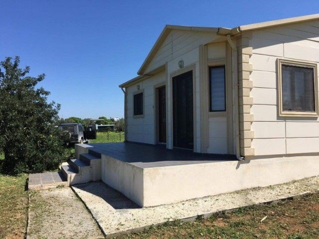 KOY YASAMINI SEVENLER ICIN, GENİS BAHCELİ 2+1 MUSTAKIL EV KARPAZ MARINA GATE 15dk
