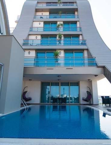 KIBRIS GİRNE MERKEZDE LÜKS YAŞAM ; SPA ,SAUNA, SPOR SALONU VE ORTAK HAVUZLU SATILIK 1+1 ,2+1 DAİRELER