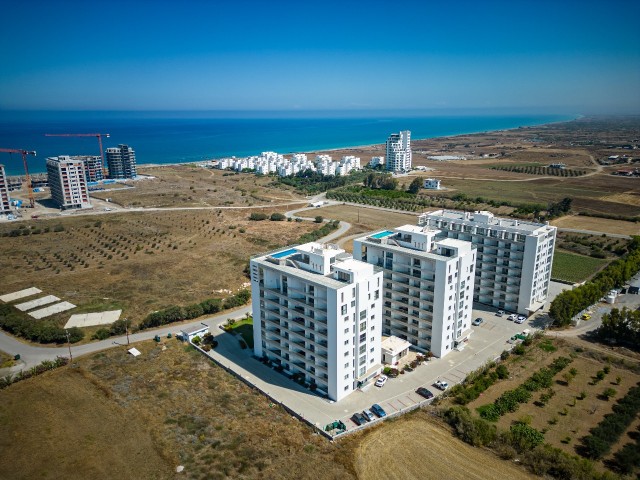 Gaziveren’de En İyi Planlamaya Sahip Denız ve Dag Manzaralı 1+1 Satılık Daire — Çok Uygun Fiyat - Fotoğraf 3