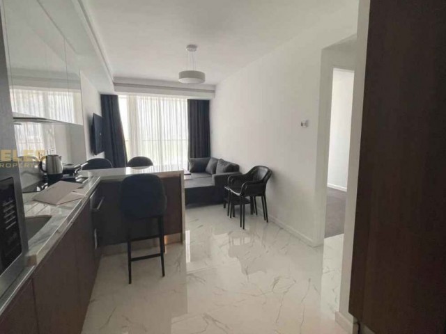 Kuzey Kıbrıs’ta Denize Sıfır Gayrimenkul — Grand Sapphire Resort’ta Şık 1+1 Daire, Kira Getirili SA-1-0425 - Fotoğraf 1