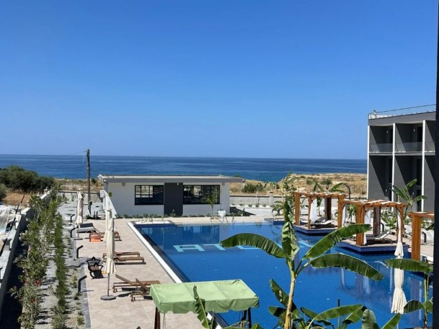 Girne Lapta Denize Sıfır Havuzlu Sitede Satılık 2+1 Daire/ 107m2
