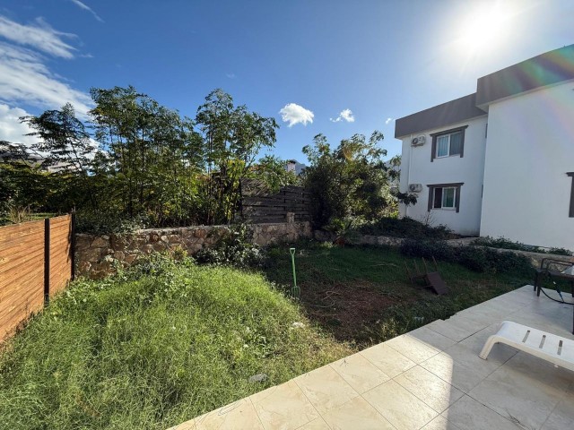 Girne/ Karaoğlanoğlun'da kiralık 1+1 Bahceli daire 