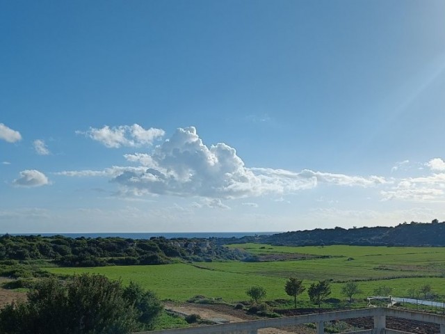 DİPKARPAZ DA NET DENİZ MANZARALI YAIRIMLIK 11 DÖNÜM SATILIK ARAZİ DÖNÜM FİYATI 15,000 GBP ADEM AKIN 05338314949