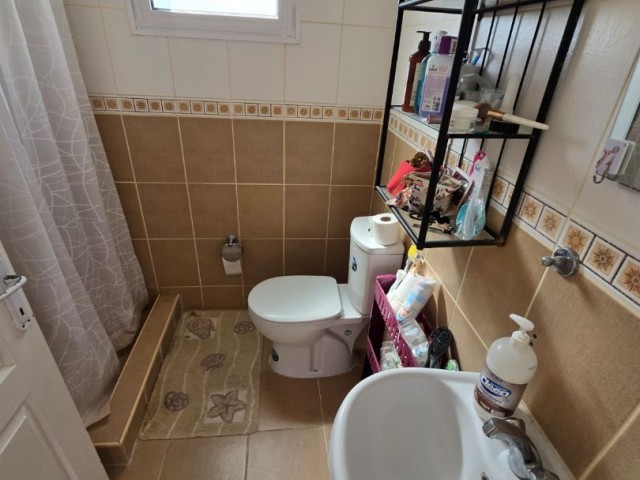 Girne, Lapta'da satılık çatı teraslı 2+1 daire. - Fotoğraf 1