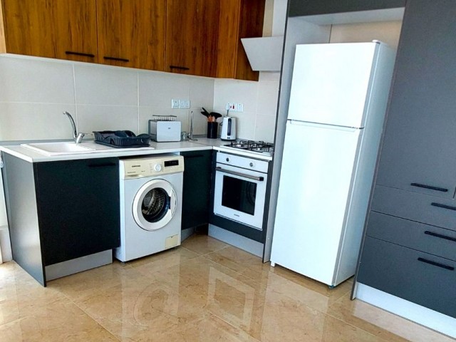 İSKELE BAHÇELER BÖLGESİNDE 2+1 FULL EŞYALI DENİZE 600 M UZAKLIKTA ORTAK YÜZME HAVUZLU KONFORLU, UYGUN FİYATLI SATILIK APT DAİRELERİ