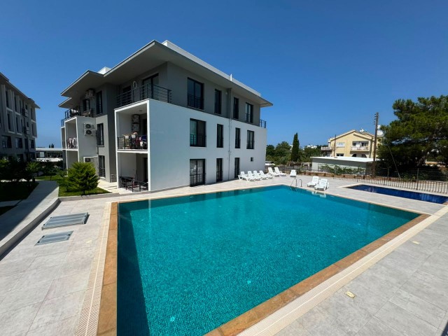 GİRNE -ALSANCAK BÖLGESİNDE LÜKS SİTE İÇERİSİNDE SATILIK 1+1  !!