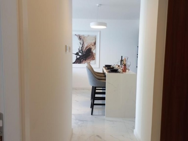 İskele Loungbeach de yedi yıldızlı otelin yanında yükselen rezidans , denize yürüme mesafesi casino ve daha bir çok ayrıcalıklarla harika bir konsept içerisinde satılık 1+1 rezidans HABİBE ÇETİN 05488547005 - Fotoğraf 1