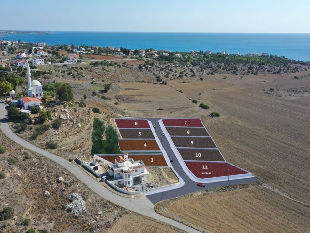 İskele Boğaz tepede dağ ve deniz manzaralı da alt yapısı tamamlanmış arsalar AYŞE KEŞ 05488547006 - Fotoğraf 1