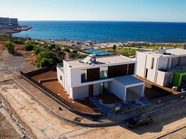 Girne çatal köyde  deniz manzaralı Türk Koçanlı 4+1 havuzlu villa